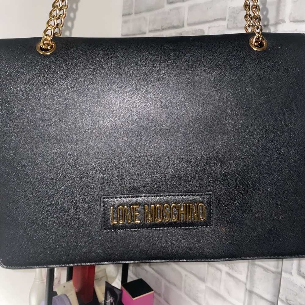 Love Moschino black shoulder bag with red interior(used)
